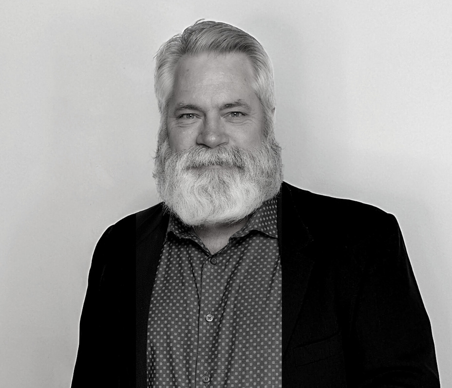Black and White Bearded headshot of Todd smith without a tie